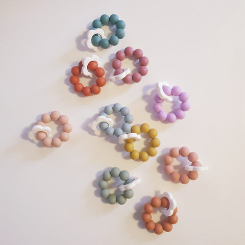 Flower Child freezable silicone teething toy - assorted colours